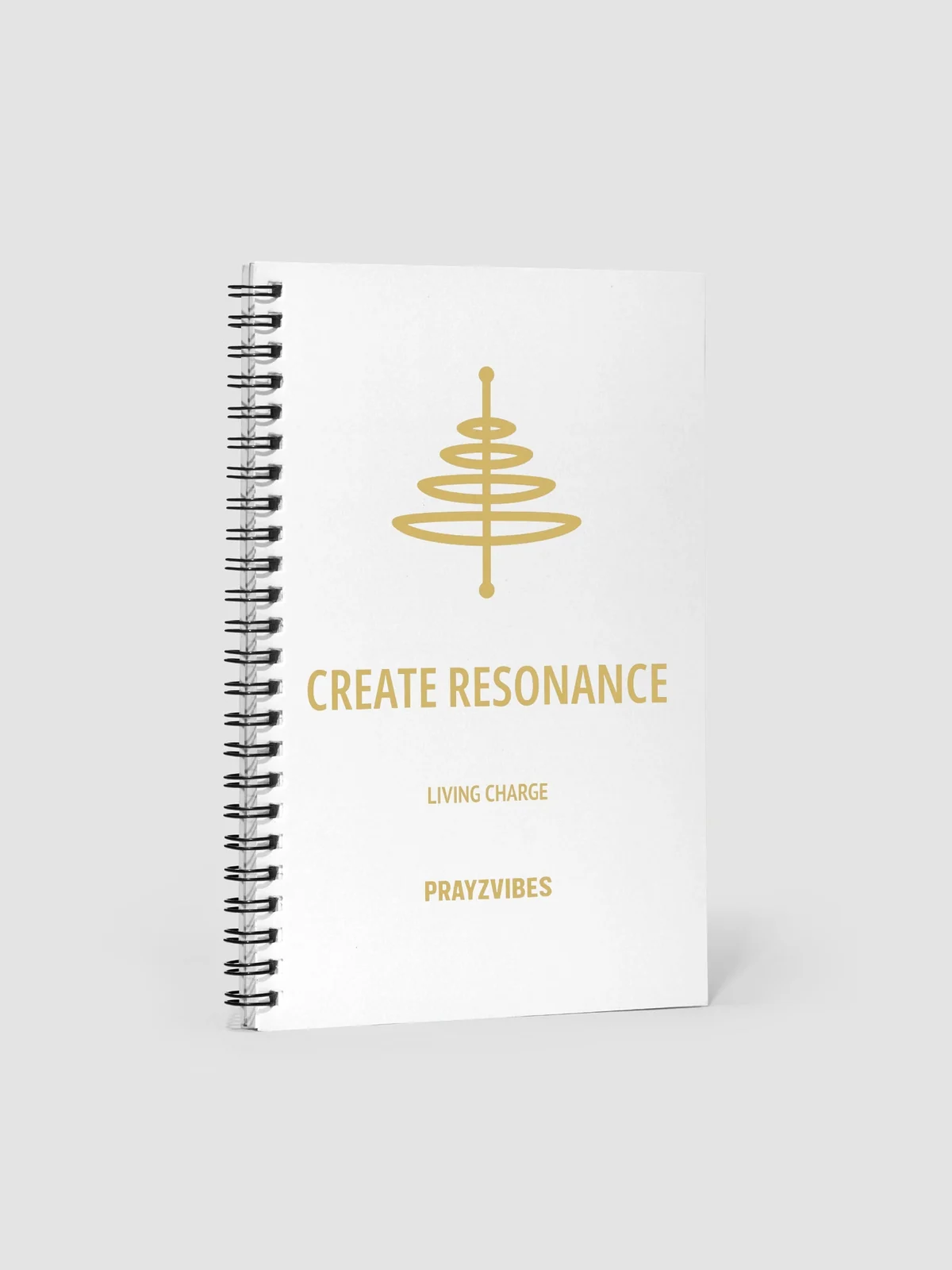 White Living Charge spiral notebook with the gold CREATE RESONANCE artwork